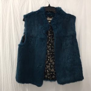 Genuine rabbit fur vest in a deep teal blue.